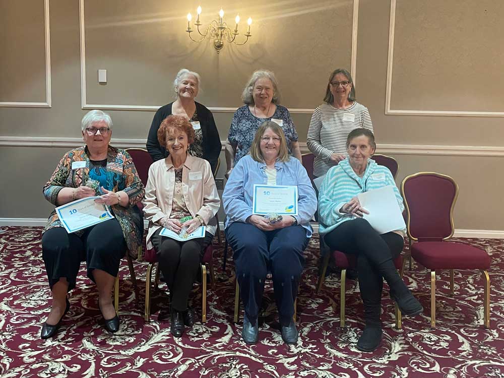 The following volunteers were recognized for 10 years of service at the Ohio’s Hospice of Dayton Volunteer Recognition Banquet in May. Pictured in the front row (left to right) are: Chris Steel, Lois Gollihugh, Vicki Hahn, and Gloria Osborne. Pictured in the back row (left to right) are: Patricia Rawson, Dotty Rezabek, and Susan Sundermeyer.