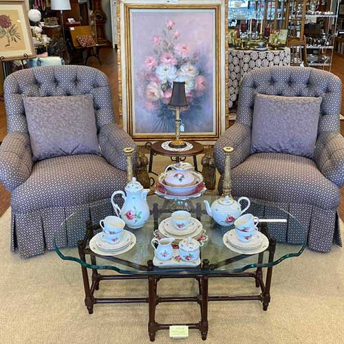 Heirlooms shop arm chairs and tea set