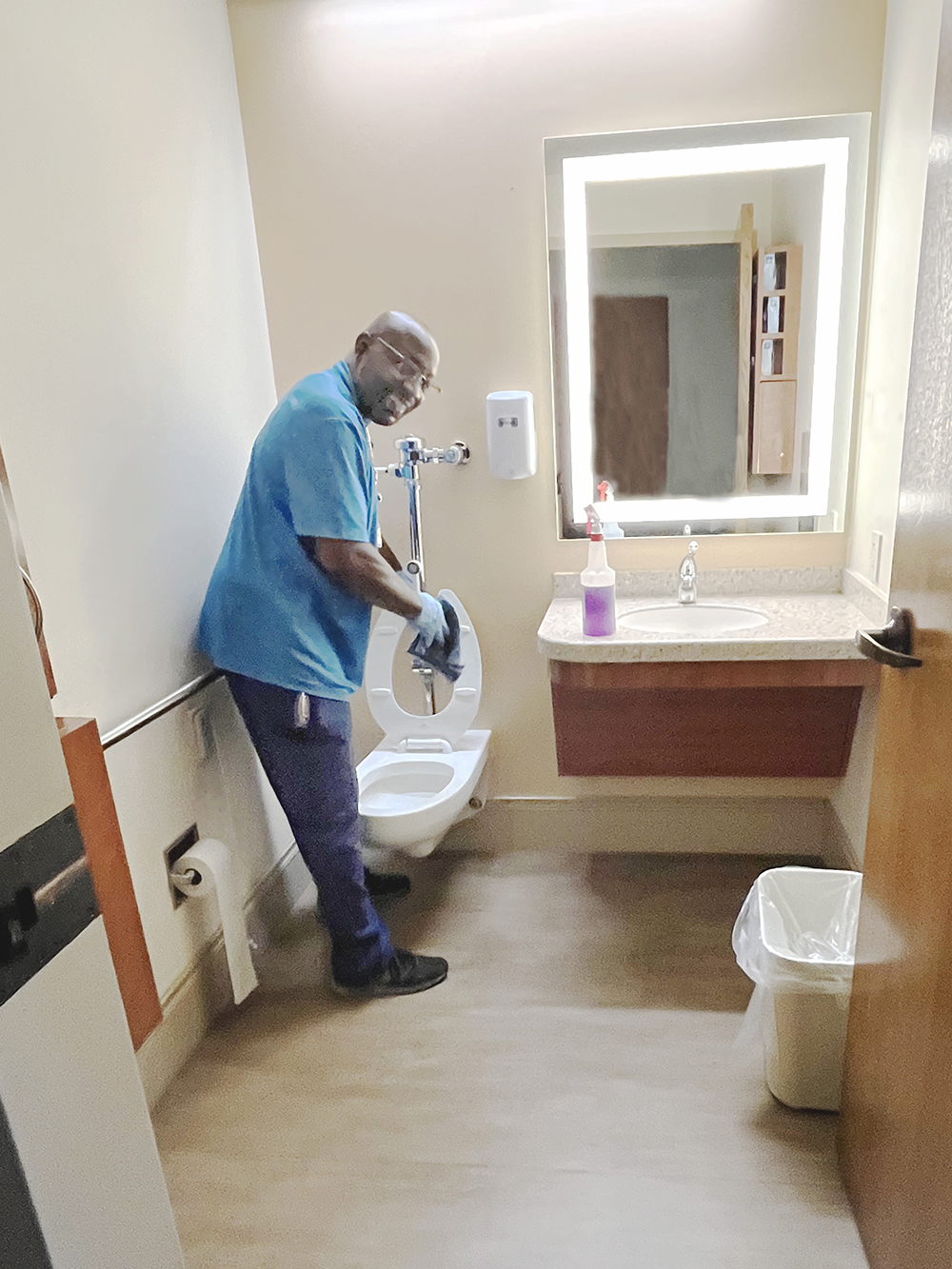 Hospitality team cleaning the bathroom