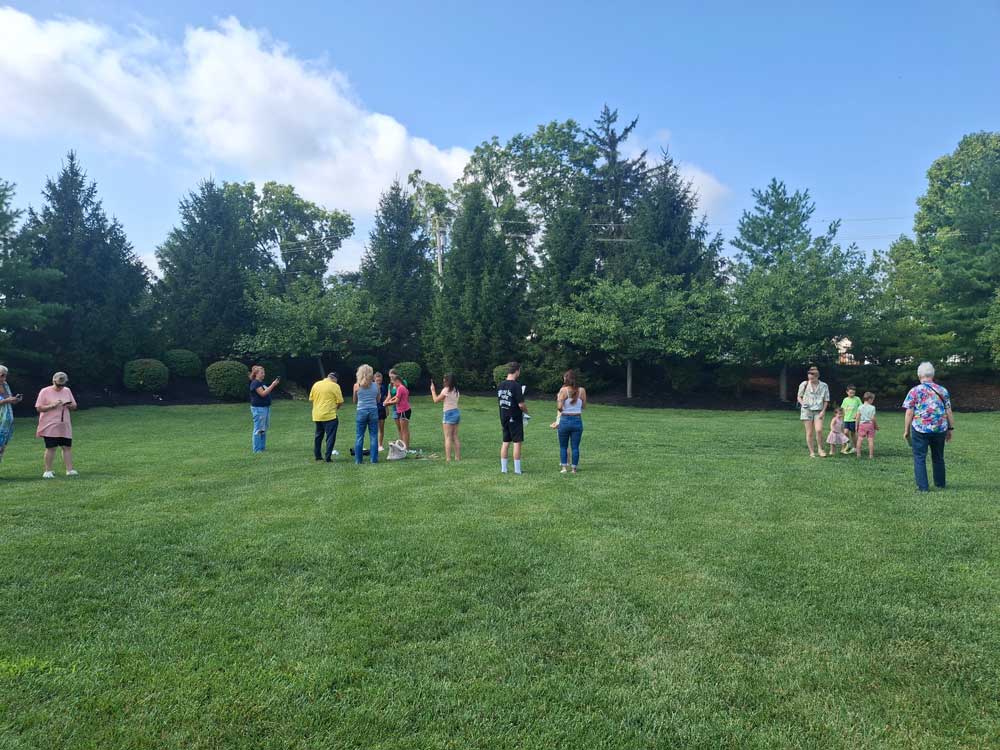 Ohio's Hospice Dayton Butterfly Release guests releasing butterflies