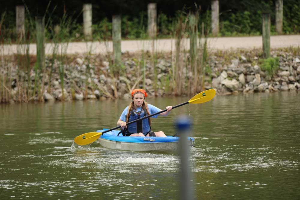 Camp Pathways 2026 child canoeing