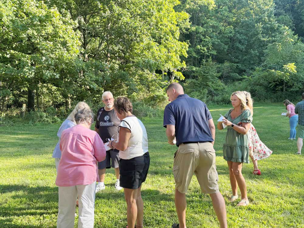 Guests releasing butterflies at Ohio's Hospice Butterfly Release